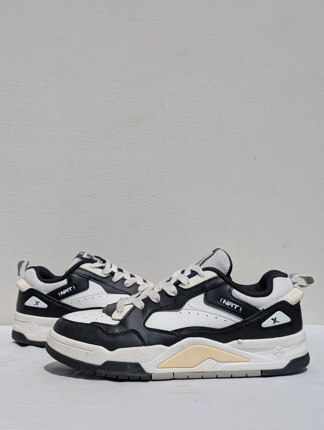 XTEP Sneakers – Black, White & Cream Retro Style