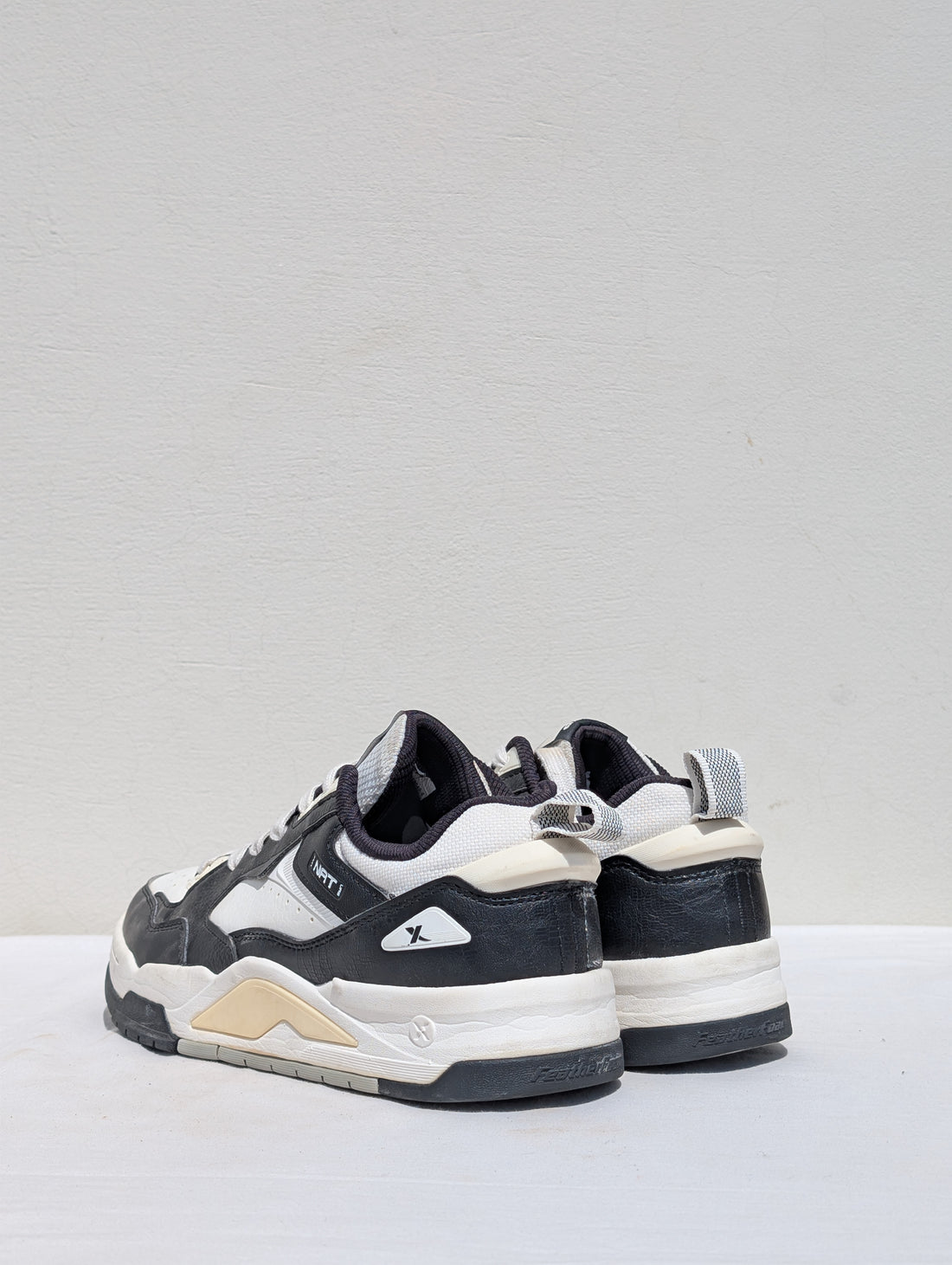 XTEP Sneakers – Black, White & Cream Retro Style