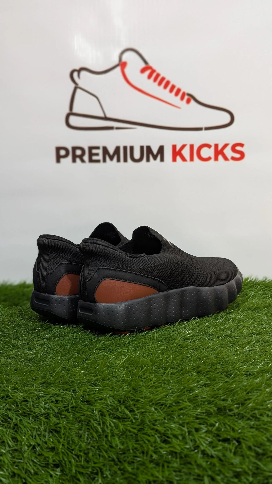 Black Slip-On Running Shoes with Brown Heel Accent