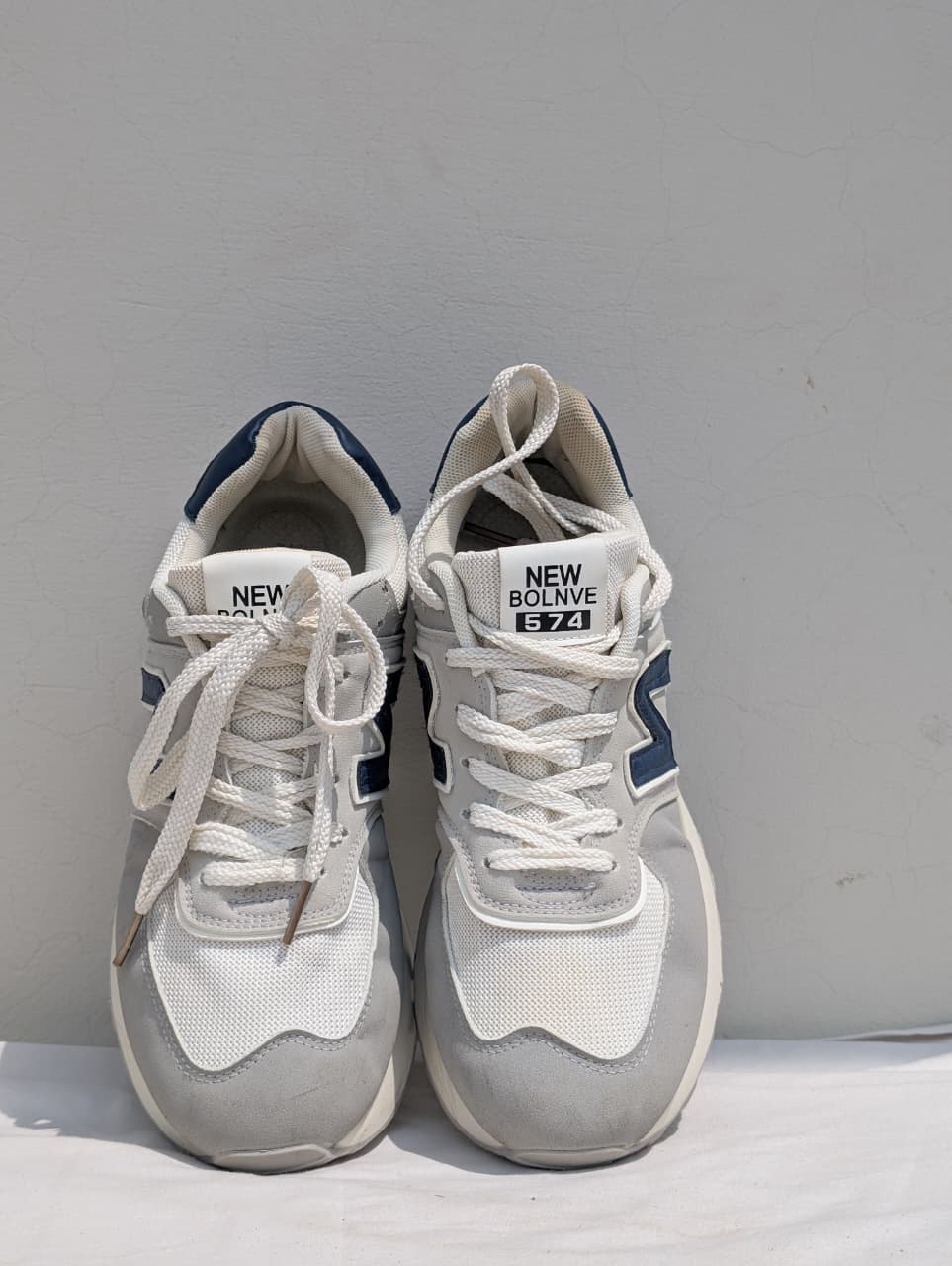 New Balance 574 White & Navy Sneakers